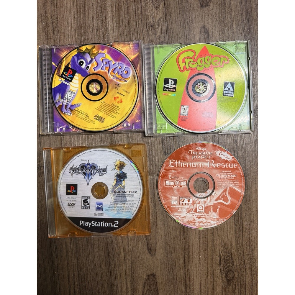Lot of 4 Vintage Video Game Discs PS1 PlayStation 2 PC Spyro Frogger Kingdom